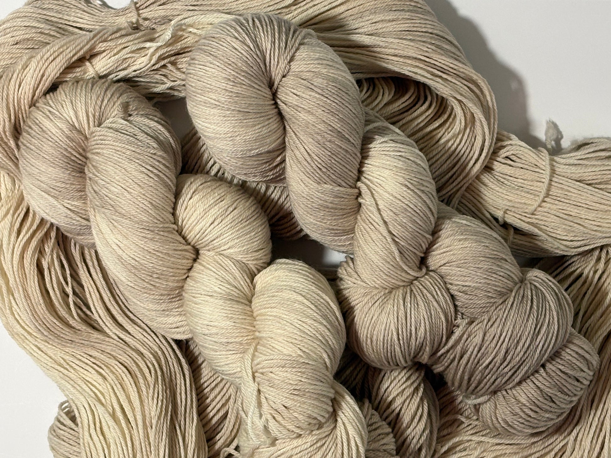 A warm, natural beige hand-dyed tonal yarn inspired by aged paper and linen. Parchment is a soft, grounded neutral designed to pair beautifully with everything.