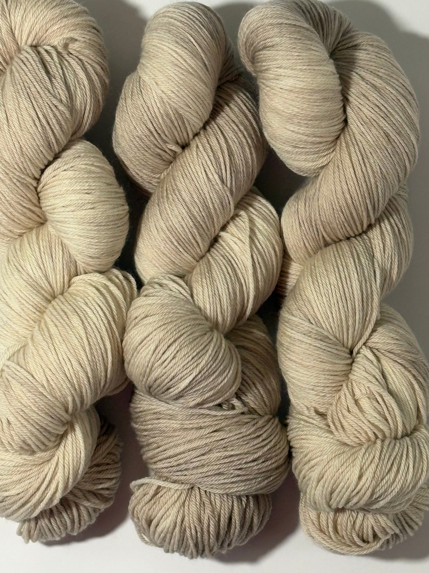A warm, natural beige hand-dyed tonal yarn inspired by aged paper and linen. Parchment is a soft, grounded neutral designed to pair beautifully with everything.