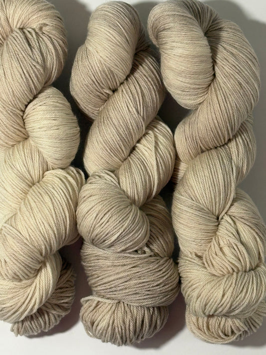 A warm, natural beige hand-dyed tonal yarn inspired by aged paper and linen. Parchment is a soft, grounded neutral designed to pair beautifully with everything.