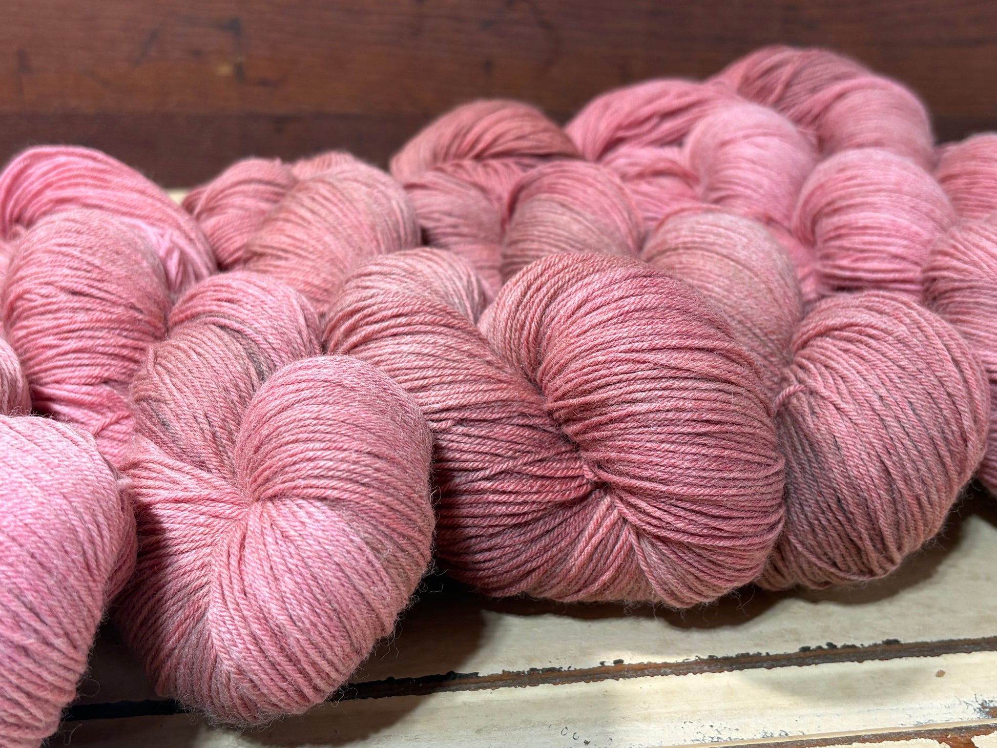 Discover Amber Hearth — a hand-dyed tonal yarn by The Curious Skein. Small batch, luxury merino nylon fingering weight yarn for knitting and crochet.