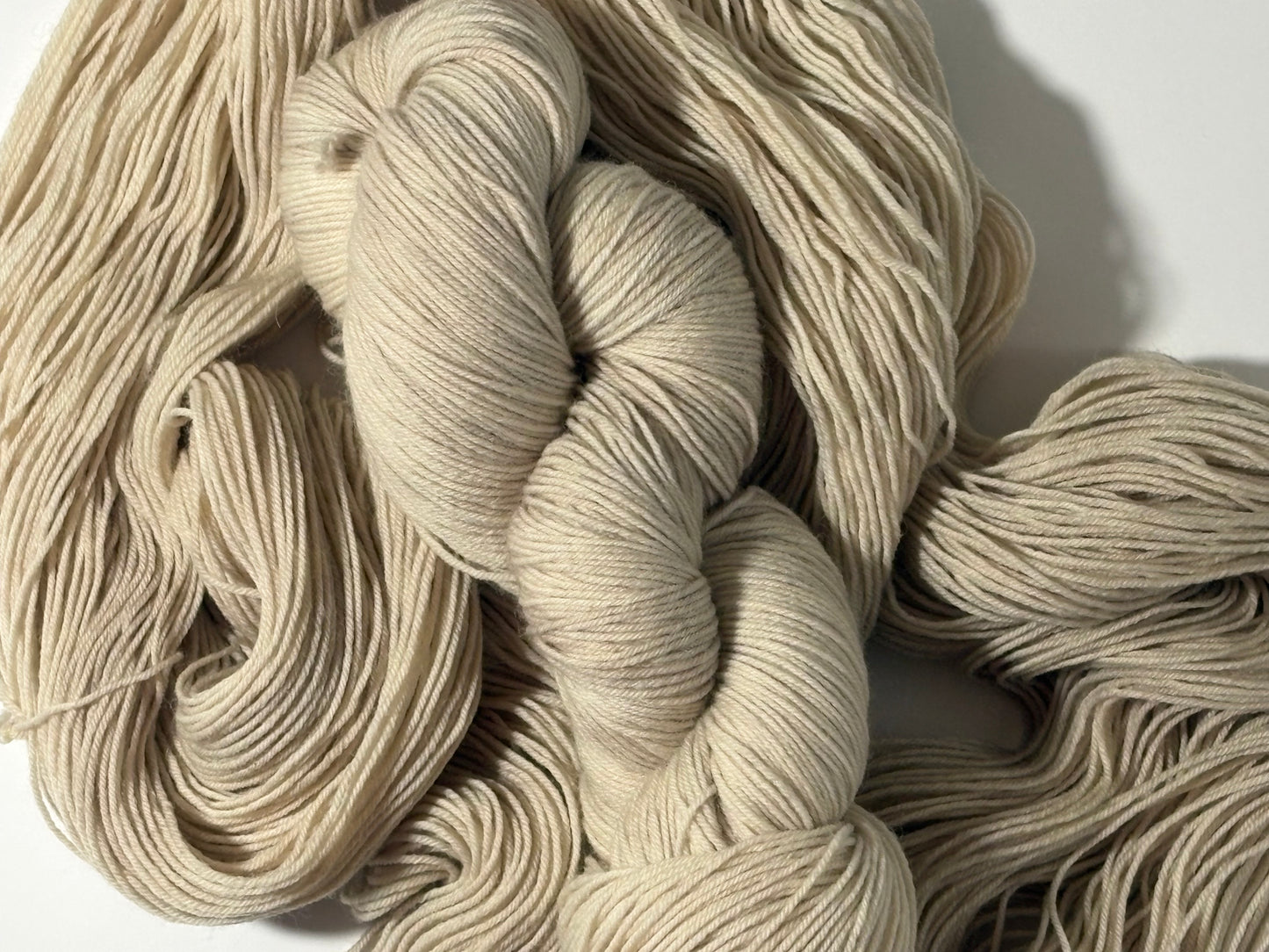 A warm, natural beige hand-dyed yarn inspired by aged paper and linen. Parchment is a soft, grounded neutral designed to pair beautifully with everything.