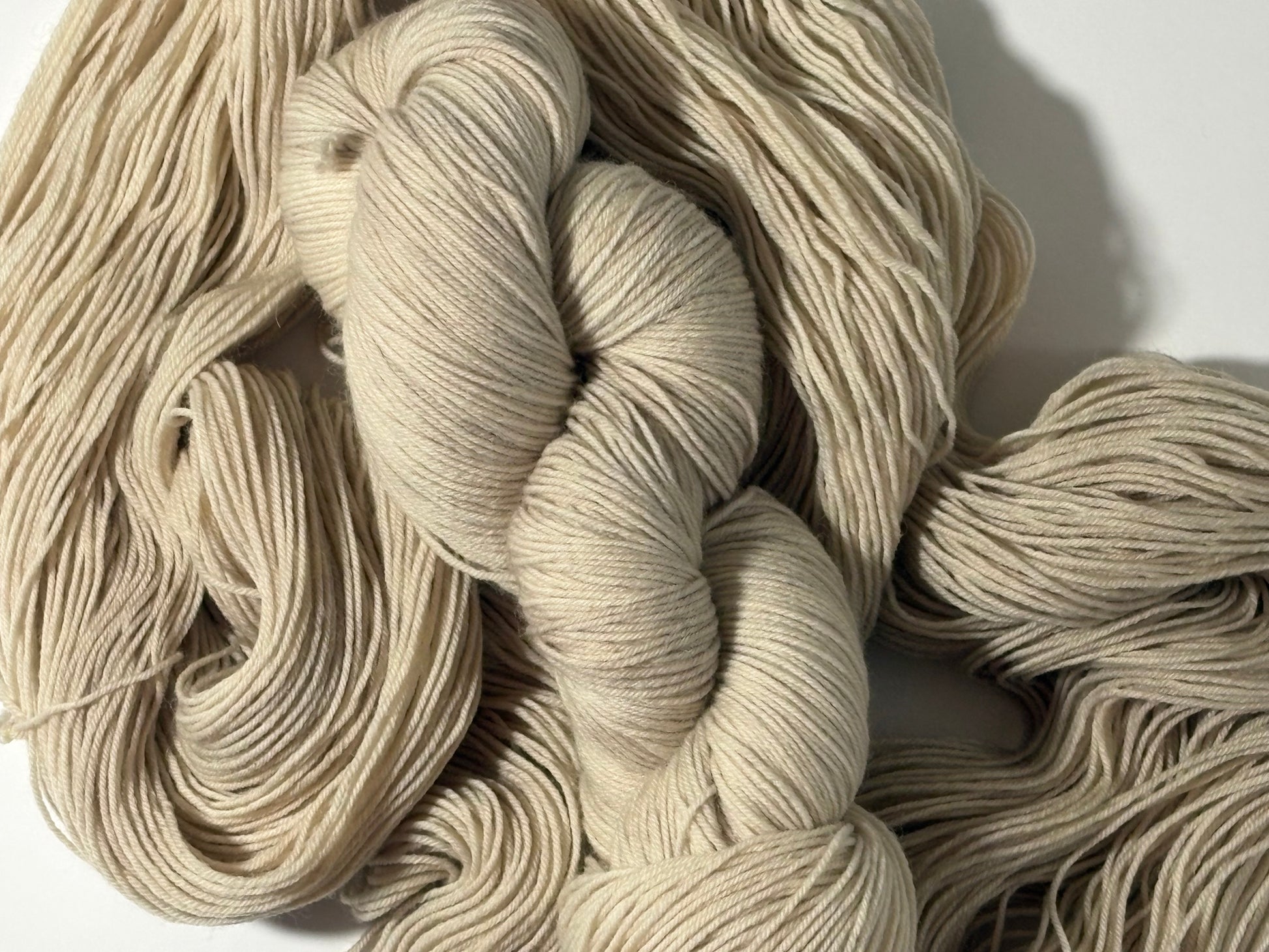 A warm, natural beige hand-dyed yarn inspired by aged paper and linen. Parchment is a soft, grounded neutral designed to pair beautifully with everything.