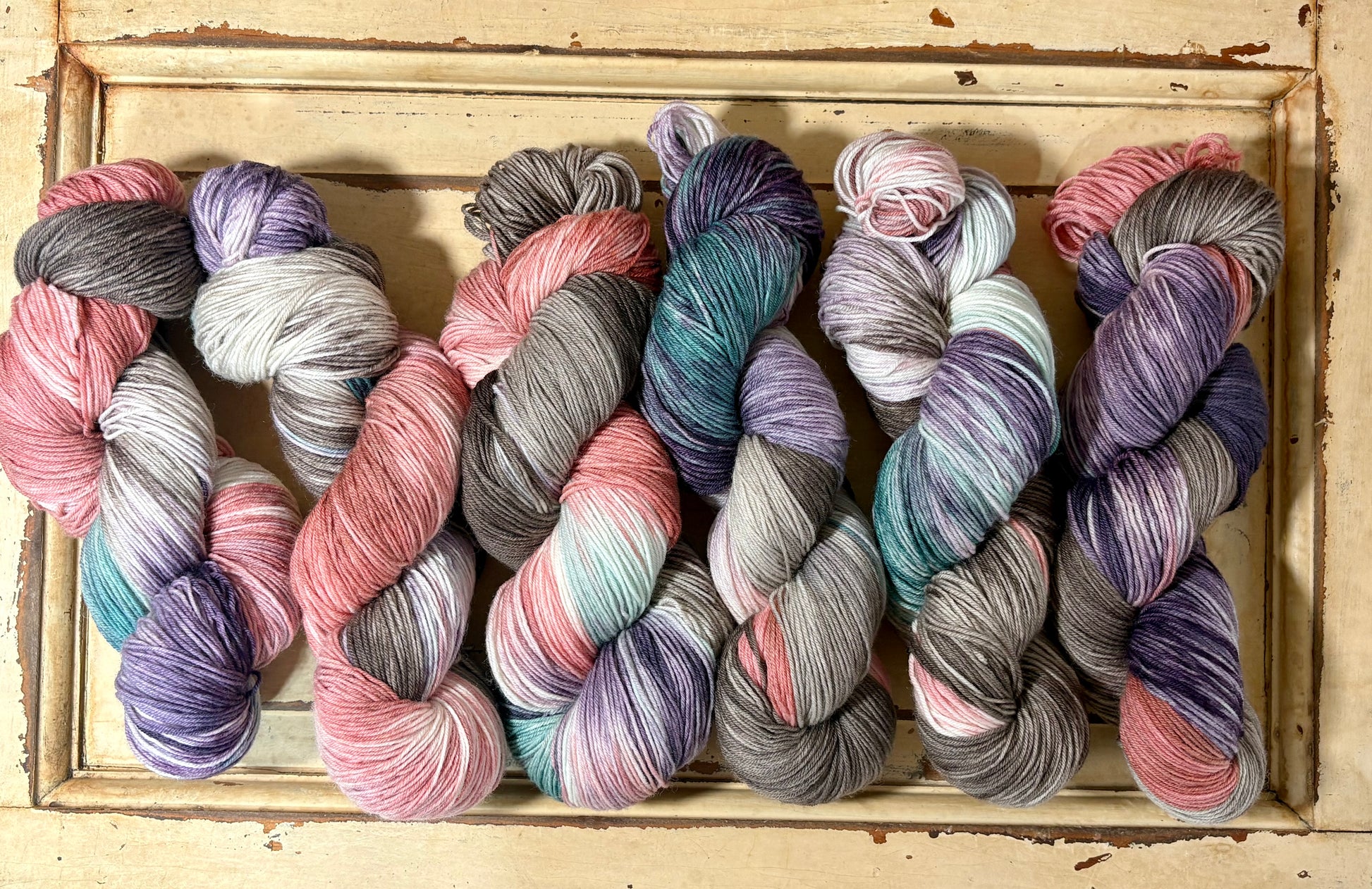 Cider Season by The Curious Skein — an indie dyed multicolored yarn inspired by crisp autumn days and cozy nights. Hand-dyed merino wool fingering weight yarn for knitting and crochet.