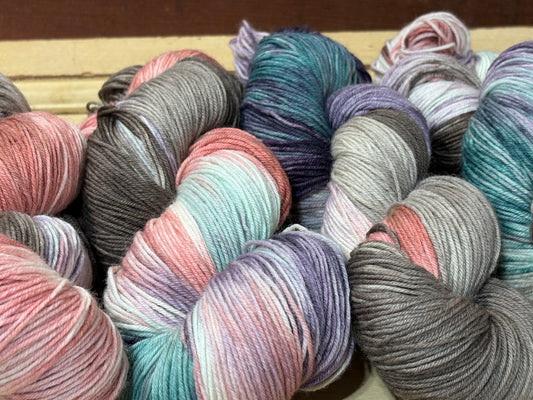 Cider Season by The Curious Skein — an indie dyed multicolored yarn inspired by crisp autumn days and cozy nights. Hand-dyed merino wool fingering weight yarn for knitting and crochet.