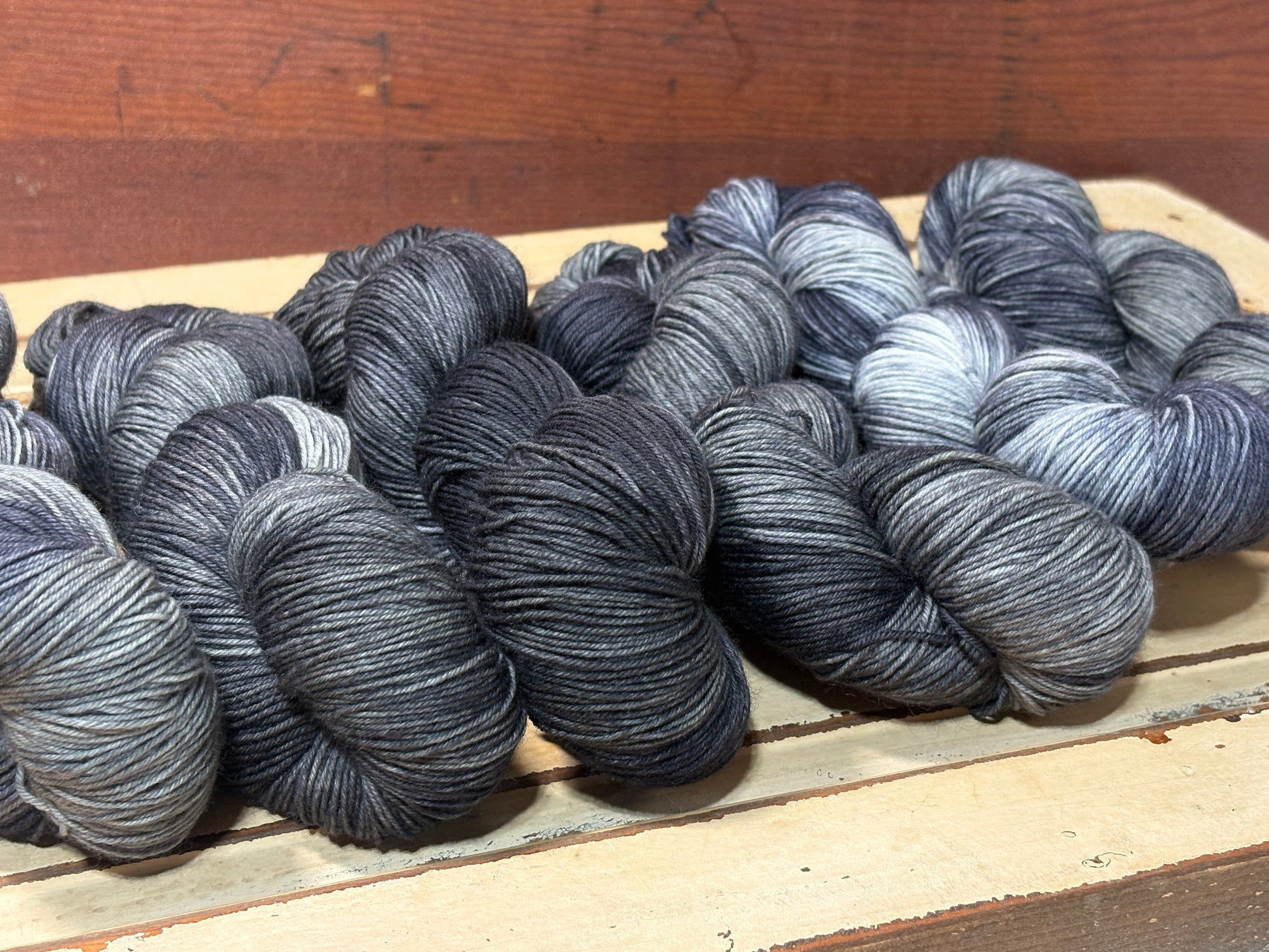 Discover Shadow Frost — a hand-dyed tonal yarn by The Curious Skein. Small batch, luxury merino nylon fingering weight yarn for knitting and crochet.