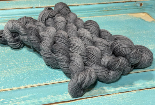 Small batch, hand-dyed yarn in Smokeveil by The Curious Skein - 80% merino wool/ 20% nylon.